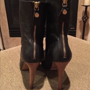 Black leather high heeled booties 8